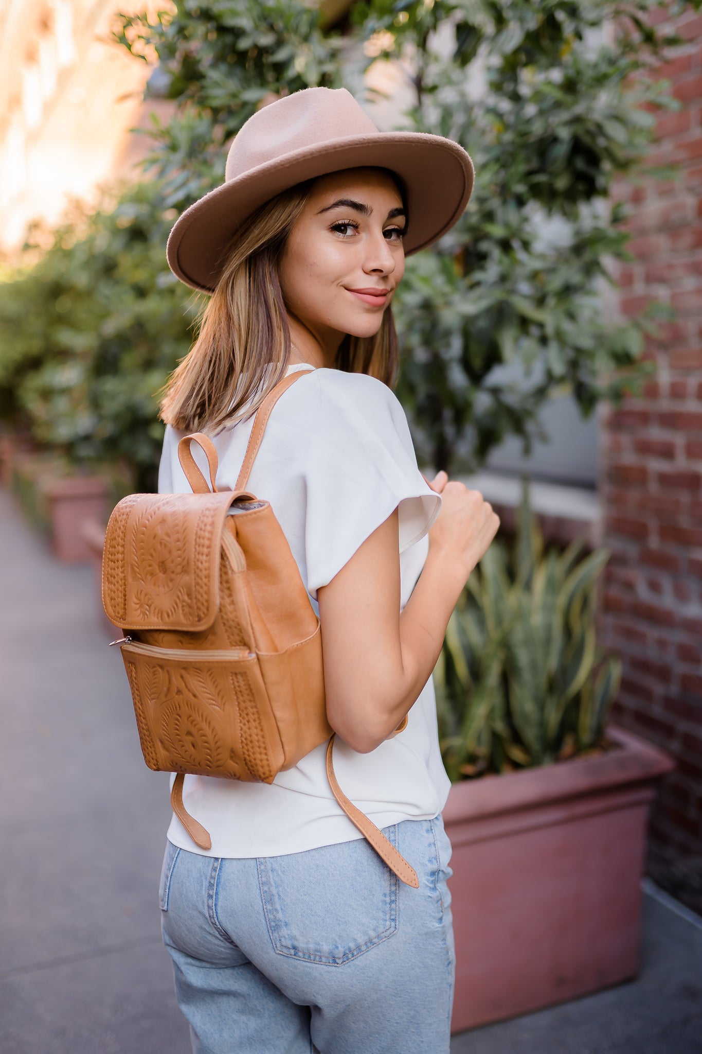 Leather Backpack Purse. Hand Tooled Leather, Multi-Pocket, and Cotton Lining